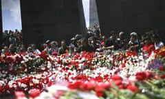 People gather at a ceremony marking the anniversary of mass killings of Armenians in 1915