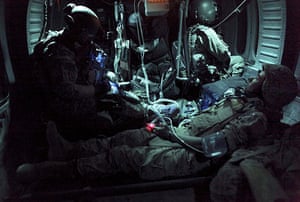 24 hours in pictures: Helmand province, Afghanistan: A medevac mission over Marjah at night