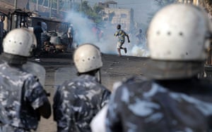 24 hours in pictures: Lome, Togo: Security forces fire tear gas