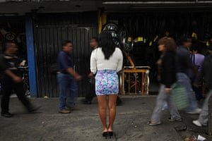 24 hours in pictures: Mexico City, Mexico: A sex worker waits for clients
