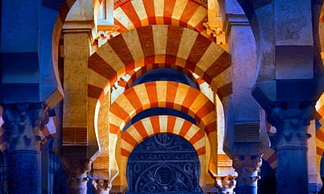 Red and yellow archways in the Cordoba mosque