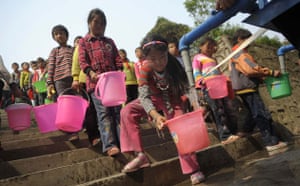 Drought in South China: Pupils collect water in drought-hit Luoping County, Qujing, Yunnan province