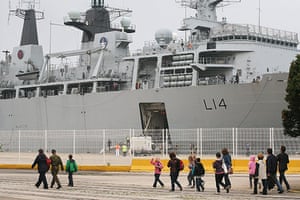 Stranded passengers: A group of children from Manchester board HMS Albion at Santander, Spain