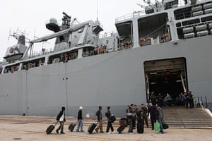 Stranded passengers: British passengers board HMS Albion at Santander port, Spain