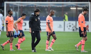 Inter v Barca: Dejected Barcelona players trudge off the pitch