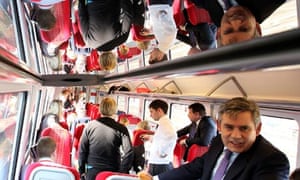 Gordon Brown speaks to journalists on a train to London on 26 April 2010.