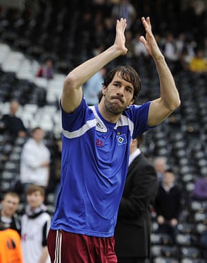 Fulham v Hamburg: Ruud Van Nistelrooy waves to the travelling fans as he comes on to warm up