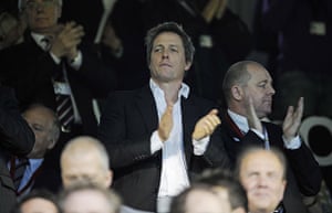 Fulham v Hamburg: Hugh Grant applauds as the teams come onto the pitch