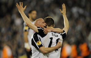 Fulham v Hamburg: Konchesky and Gera hug on the final whistle.