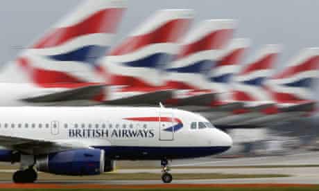 A British Airways plane lands at Heathrow Airport.