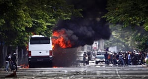 Thailand protests: Anti-government demonstrators set fire to a police bus near Lumpini Park