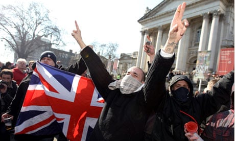 English Defence League members attend a march