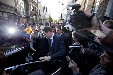 Campaigning with Clegg: Nick Clegg is mobbed by media in Richmond
