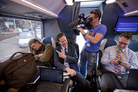 Campaigning with Clegg: Nick Clegg jokes around with a sleeping soundman on the tour bus