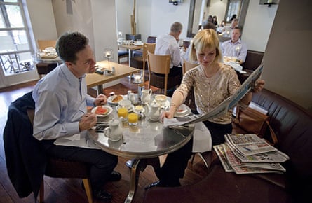 Campaigning with Clegg: Nick Clegg has breakfast in his hotel in Manchester with aide Lena Pietsch