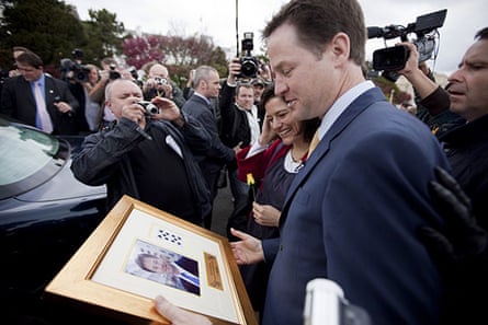 Campaigning with Clegg: Nick Clegg is handed a picture he'd signed for charity in Eastbourne