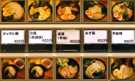 An automated ticket dispenser at a ramen noodle restaurant in Tokyo, Japan