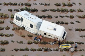 France Floods: Puget-sur-Argens: People retrieve personal belongings from their caravan