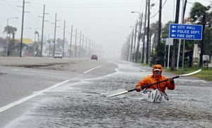Hurricane Alex: A man paddles down Padre Boulevard in his kayak