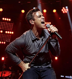 Take That: Robbie Williams performs on stage at the BBC Electric Proms