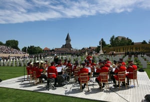 Fromelles: A military band plays during the burial of the final soldier