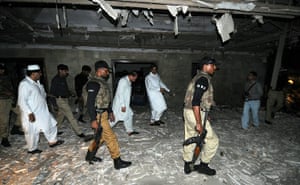 Lahore bombings: Pakistani security officials examine the scene