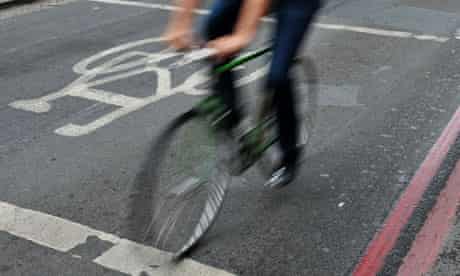 A cyclist riding a bicycle in London 