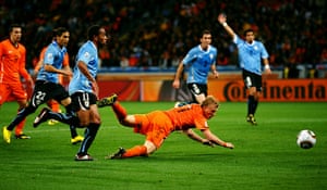 Holland versus Uruguay: Dirk Kuyt beats the Uruguay offside trap but his diving header goes wide