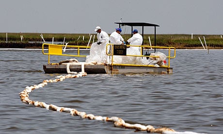 Workers continue to collect leaked oil off the coast of Louisiana