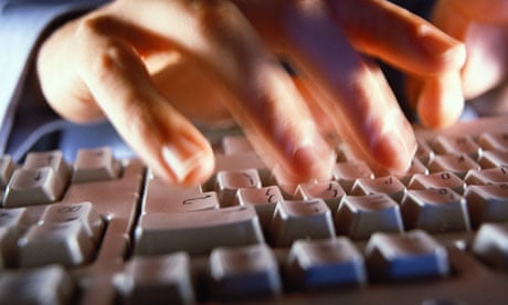 Man at a computer keyboard