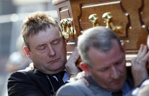 Alex higgins funeral: Jimmy White carries the coffin