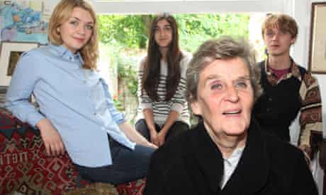 Jane Miller at home with her grandchildren Dora (left), Natasha and Joe