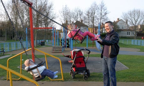 father children swings park