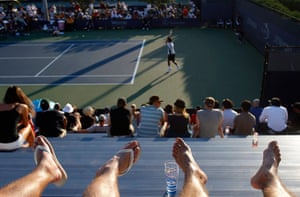 sport: Fans relax in the stands