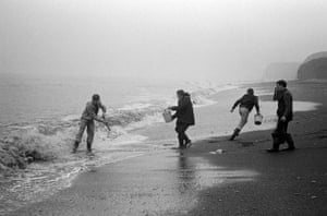 No redemption: Men collect sea coal from a beach north of Easington
