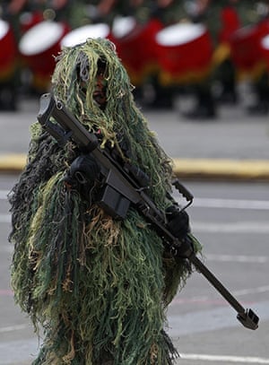 mexcico 2: A Mexican army sniper parades in camouflage 