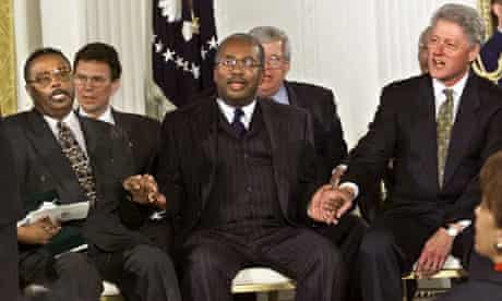 Jefferson Thomas (L) and Ernest Green (C) of the Little Rock Nine, with President Bill Clinton