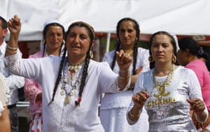 Roma celebrations: Roma women dance as they gather to celebrate the birthday of St Mary 