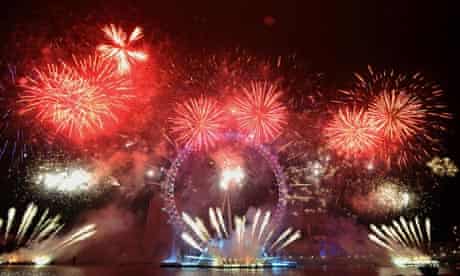 Fireworks light up the sky over the London Eye during New Year's Eve celebrations
