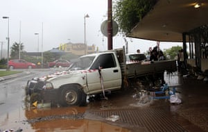 Floods in Australia: People survey the damage after a flash flood in Toowoomba
