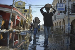 Haiti then and now: January 2010: People looting food in Port-au-Prince 