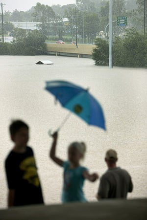 Queensland floods: The Bremer River engulfs the Jim Finimore Sports Ground in West Ipswich 