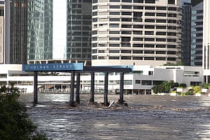 Brisbane floods: The Holman street ferry is submerged by the water from the Brisbane River