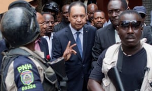 Haiti's ex-dictator Jean-Claude 'Baby Doc' Duvalier is taken out of his hotel