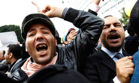 Protesters shout during the civilian unrest in Tunisia