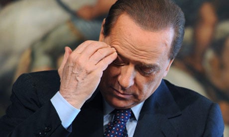 Italian Prime Minister Silvio Berlusconi gestures during a press conference in Rome.