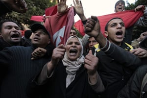 Tunisia Protests: Protesters chant slogans as they march