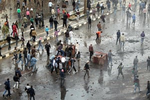 Egypt violence continues: Rocks and debris litter the streets with Egyptians protestors in Suez