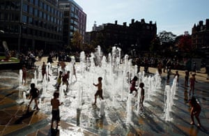 Weather: Children play in a fountain in the centre of Sheffield