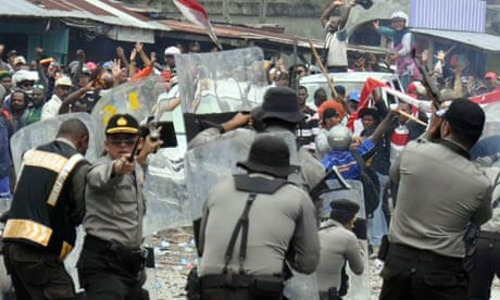 Indonesian Police clash with striking miners employed by US company Freeport McMoran